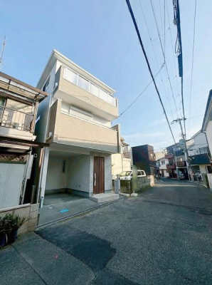 ���{�哌�s�䋟�c3���ڂ̐V�z��ˌ��Ă̑O�ʓ��H�܂ތ��n�ʐ^