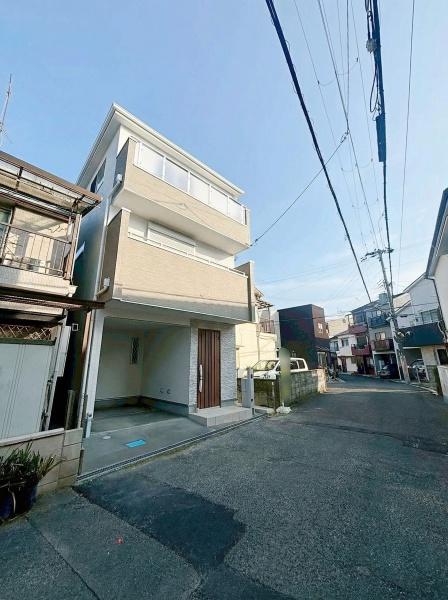 ���{�哌�s�䋟�c3���ڂ̐V�z��ˌ��Ă̑O�ʓ��H�܂ތ��n�ʐ^