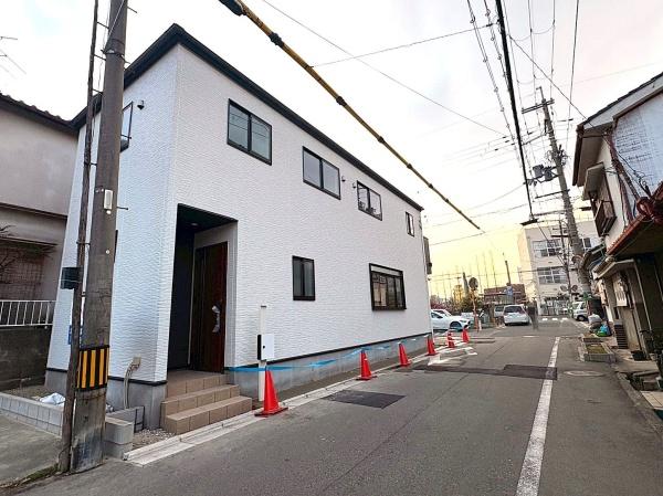 ���{�����s��c�{��2���ڂ̐V�z��ˌ��Ă̑O�ʓ��H�܂ތ��n�ʐ^