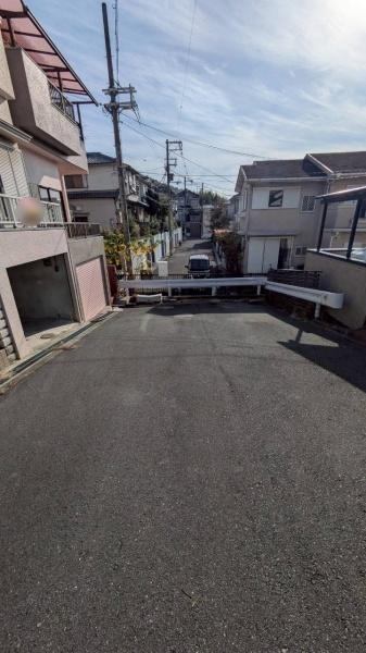 ���{�����s�Z������1���ڂ̒��È�ˌ��Ă̑O�ʓ��H�܂ތ��n�ʐ^