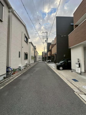 ���{��^�s���n�����̒��È�ˌ��Ă̑O�ʓ��H�܂ތ��n�ʐ^