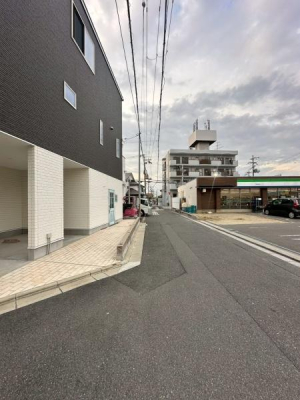 ���{��^�s���n�����̒��È�ˌ��Ă̑O�ʓ��H�܂ތ��n�ʐ^