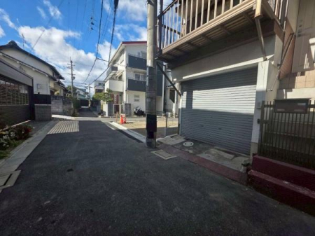 ���{��^�s��Ւ��̒��È�ˌ��Ă̑O�ʓ��H�܂ތ��n�ʐ^