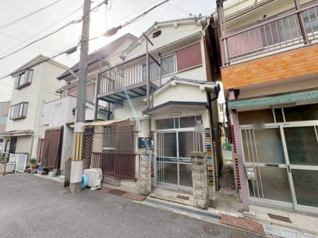 ���{�����s�z�s��1���ڂ̒��È�ˌ��Ă̑O�ʓ��H�܂ތ��n�ʐ^