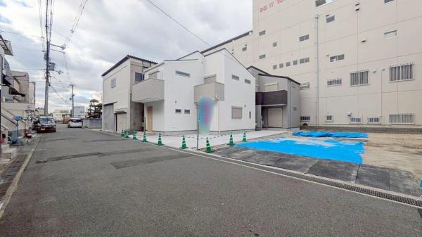 ���{�����s��㏬��̐V�z��ˌ��Ă̑O�ʓ��H�܂ތ��n�ʐ^