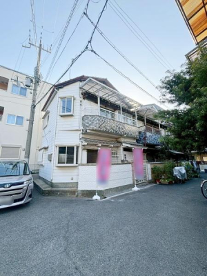 ���{�����s��t1���ڂ̒��È�ˌ��Ă̑O�ʓ��H�܂ތ��n�ʐ^