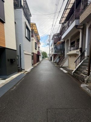 ���{��^�s�l�{2���ڂ̒��È�ˌ��Ă̑O�ʓ��H�܂ތ��n�ʐ^