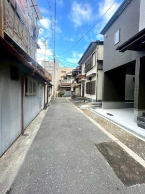 ���{���s���Z�g��Y�S7���ڂ̐V�z��ˌ��Ă̑O�ʓ��H�܂ތ��n�ʐ^