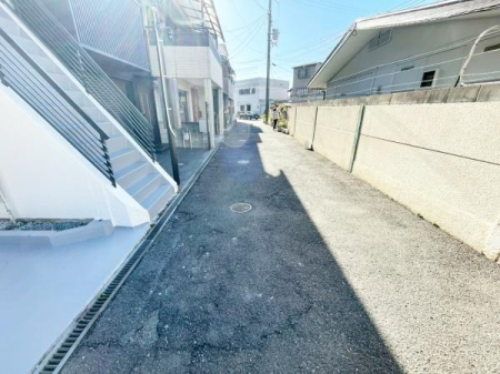 ���Ɍ����s�����c��8���ڂ̒��È�ˌ��Ă̑O�ʓ��H�܂ތ��n�ʐ^