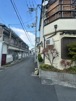 ���{����s���c��1���ڂ̓y�n�̑O�ʓ��H�܂ތ��n�ʐ^