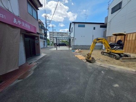 ���{��^�s��ΐ����̓y�n�̑O�ʓ��H�܂ތ��n�ʐ^