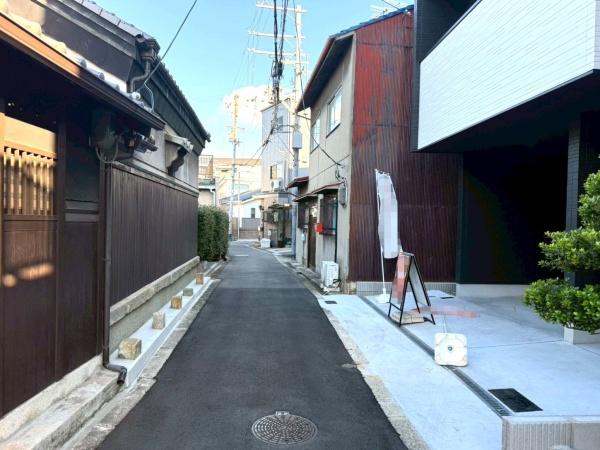 ���{���s�����F��1���ڂ̐V�z��ˌ��Ă̑O�ʓ��H�܂ތ��n�ʐ^