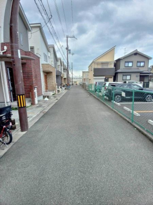 ���{�����s��@�k3���ڂ̒��È�ˌ��Ă̑O�ʓ��H�܂ތ��n�ʐ^