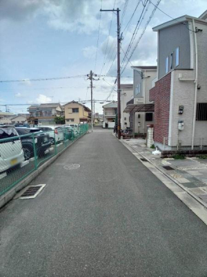 ���{�����s��@�k3���ڂ̒��È�ˌ��Ă̑O�ʓ��H�܂ތ��n�ʐ^