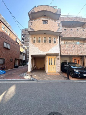 ���{���s���Z�g��鍇3���ڂ̒��È�ˌ��Ă̑O�ʓ��H�܂ތ��n�ʐ^