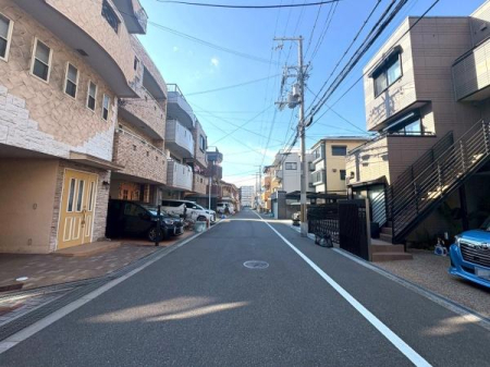 ���{���s���Z�g��鍇3���ڂ̒��È�ˌ��Ă̑O�ʓ��H�܂ތ��n�ʐ^