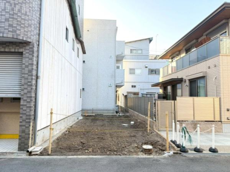 ���{���s�����c��1���ڂ̐V�z��ˌ��Ă̌��n�O�ώʐ^