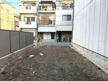 ���{���s�����c��1���ڂ̐V�z��ˌ��Ă̂��̑����n