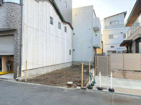 ���{���s�����c��1���ڂ̐V�z��ˌ��Ă̂��̑����n