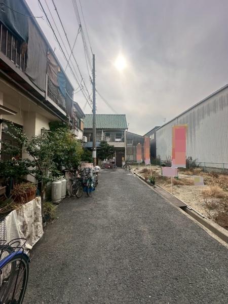 ���{��^�s�l�{6���ڂ̓y�n�̑O�ʓ��H�܂ތ��n�ʐ^