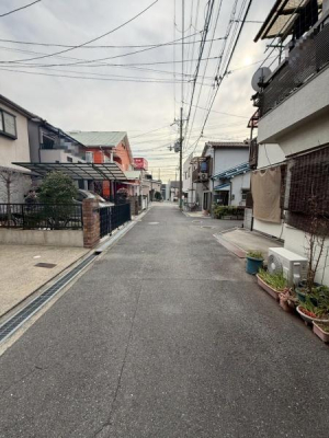 ���{�Q����s�r�c�{���̒��È�ˌ��Ă̑O�ʓ��H�܂ތ��n�ʐ^