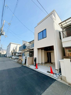 ���{�����s�ԉ�����2���ڂ̐V�z��ˌ��Ă̑O�ʓ��H�܂ތ��n�ʐ^