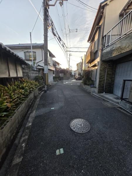 ���{��^�s���R���̓y�n�̑O�ʓ��H�܂ތ��n�ʐ^