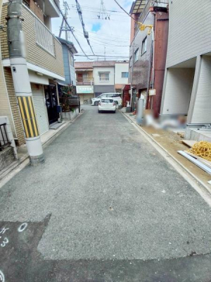 ���{�����s�V�r����3���ڂ̐V�z��ˌ��Ă̑O�ʓ��H�܂ތ��n�ʐ^