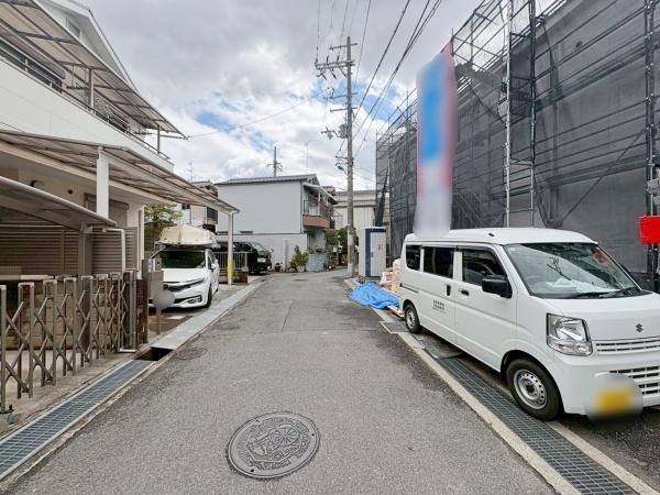 ���{�����s����3���ڂ̐V�z��ˌ��Ă̑O�ʓ��H�܂ތ��n�ʐ^