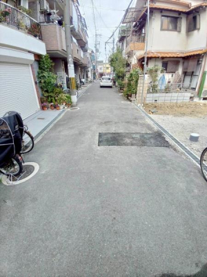 ���{�����s��@�k3���ڂ̐V�z��ˌ��Ă̑O�ʓ��H�܂ތ��n�ʐ^