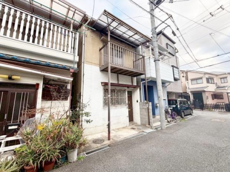 ���{�L���s壒r����1���ڂ̒��È�ˌ��Ă̑O�ʓ��H�܂ތ��n�ʐ^