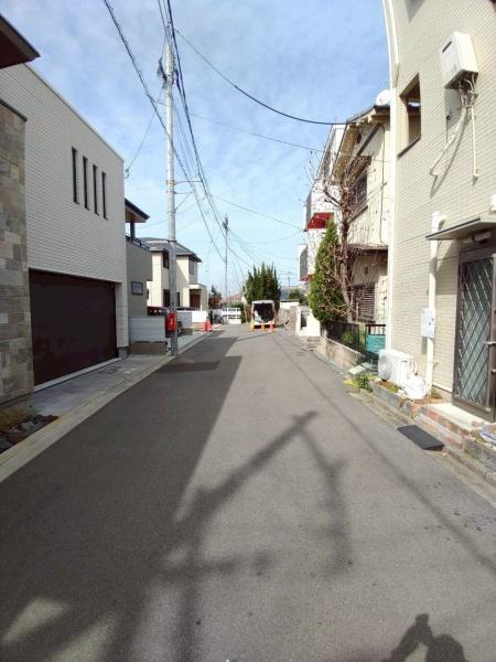 ���{�����s���ΐؒ�1���ڂ̓y�n�̑O�ʓ��H�܂ތ��n�ʐ^