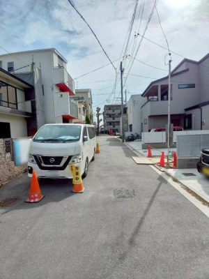 ���{�����s���ΐؒ�1���ڂ̓y�n�̑O�ʓ��H�܂ތ��n�ʐ^