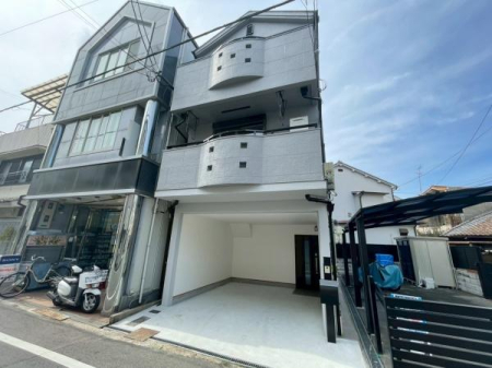 ���{���s�����\�O��4���ڂ̒��È�ˌ��Ă̑O�ʓ��H�܂ތ��n�ʐ^