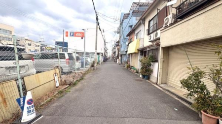 ���{���s����撆��6���ڂ̓y�n�̑O�ʓ��H�܂ތ��n�ʐ^