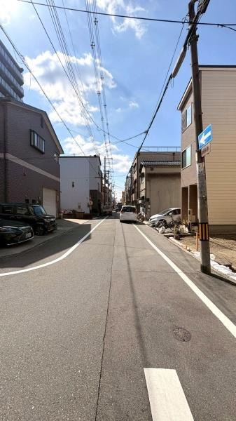 ���{���s���������k1���ڂ̓y�n�̑O�ʓ��H�܂ތ��n�ʐ^