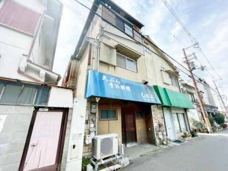 ���{�L���s�����L��2���ڂ̒��È�ˌ��Ă̑O�ʓ��H�܂ތ��n�ʐ^