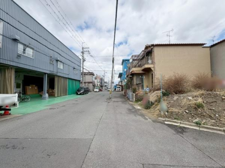 ���{�����s�ߐ�5���ڂ̓y�n�̑O�ʓ��H�܂ތ��n�ʐ^