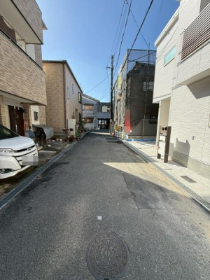 ���{�Q����s���V���̐V�z��ˌ��Ă̑O�ʓ��H�܂ތ��n�ʐ^