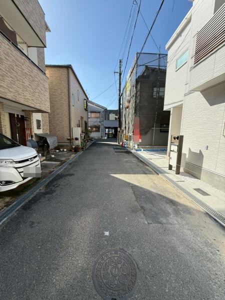 ���{�Q����s���V���̐V�z��ˌ��Ă̑O�ʓ��H�܂ތ��n�ʐ^