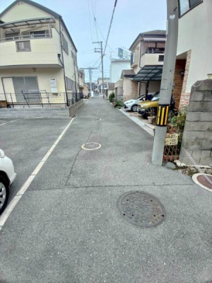 ���{�����s����c����1���ڂ̓y�n�̑O�ʓ��H�܂ތ��n�ʐ^