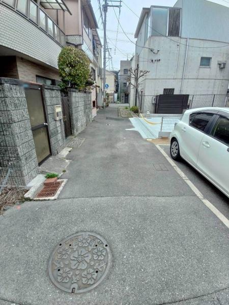 ���{�����s����c����1���ڂ̓y�n�̑O�ʓ��H�܂ތ��n�ʐ^