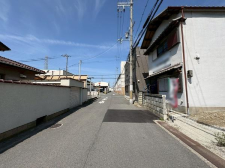 ���{�����s��a���̐V�z��ˌ��Ă̑O�ʓ��H�܂ތ��n�ʐ^