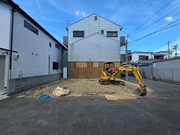 ���{��^�s��ΐ����̐V�z��ˌ��Ă̌��n�O�ώʐ^