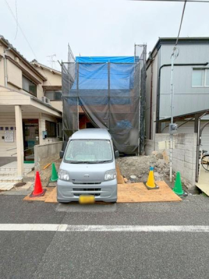 ���{�����s�썃�r��2���ڂ̐V�z��ˌ��Ă̌��n�O�ώʐ^