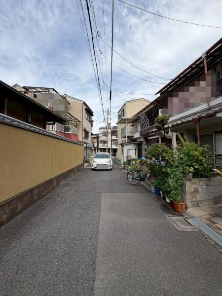 ���{��^�s�]�[���̒��È�ˌ��Ă̑O�ʓ��H�܂ތ��n�ʐ^