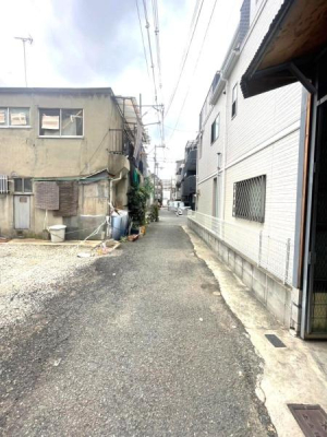 ���{���s�����F�k1���ڂ̓y�n�̑O�ʓ��H�܂ތ��n�ʐ^