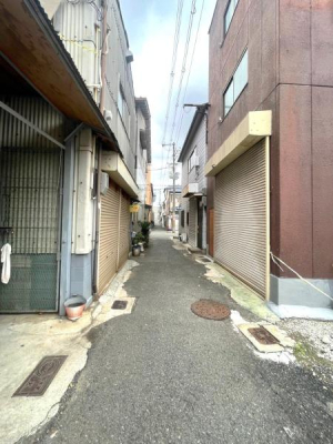 ���{���s�����F�k1���ڂ̓y�n�̑O�ʓ��H�܂ތ��n�ʐ^