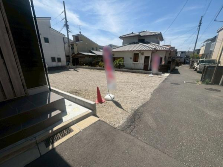 ���{�����s�{���̓y�n�̑O�ʓ��H�܂ތ��n�ʐ^