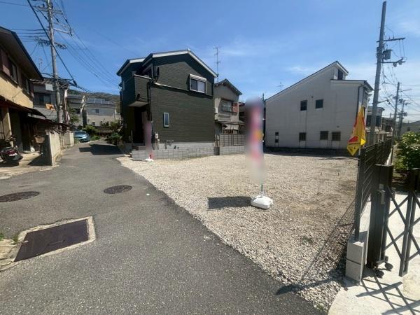 ���{�����s�{���̓y�n�̑O�ʓ��H�܂ތ��n�ʐ^